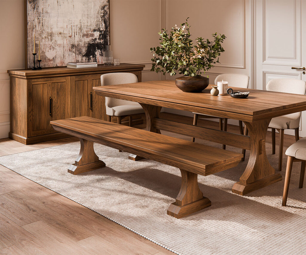 Choosing the Right Wood Species for Your Home 2 Amish oak trestle dining table with bench and sideboard in bright dining room.